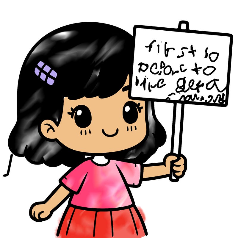 girl holding up a sign