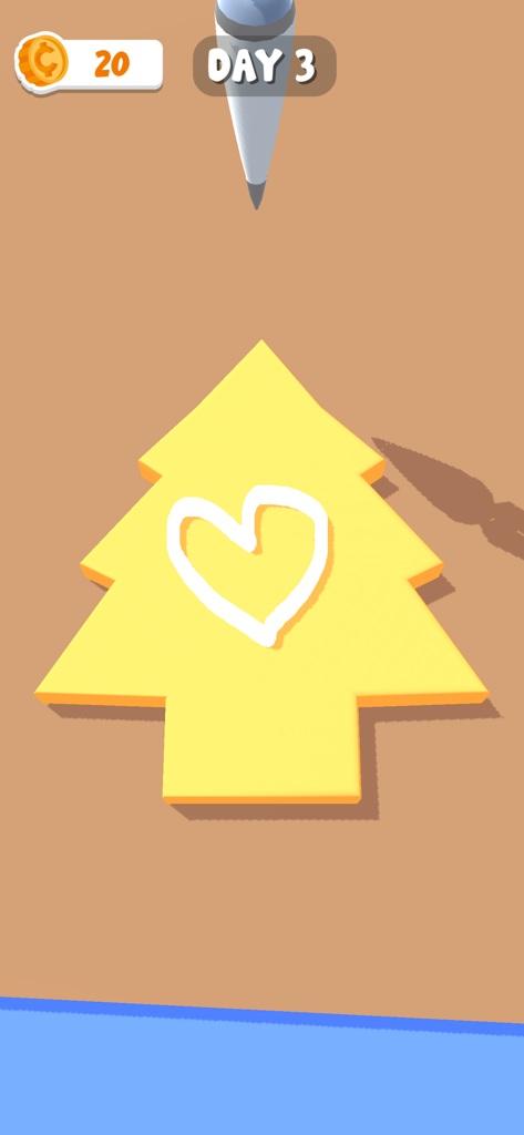 Holiday Home 3D - A yellow tree-shaped cookie being decorated with a white heart in the Holiday Home 3D app