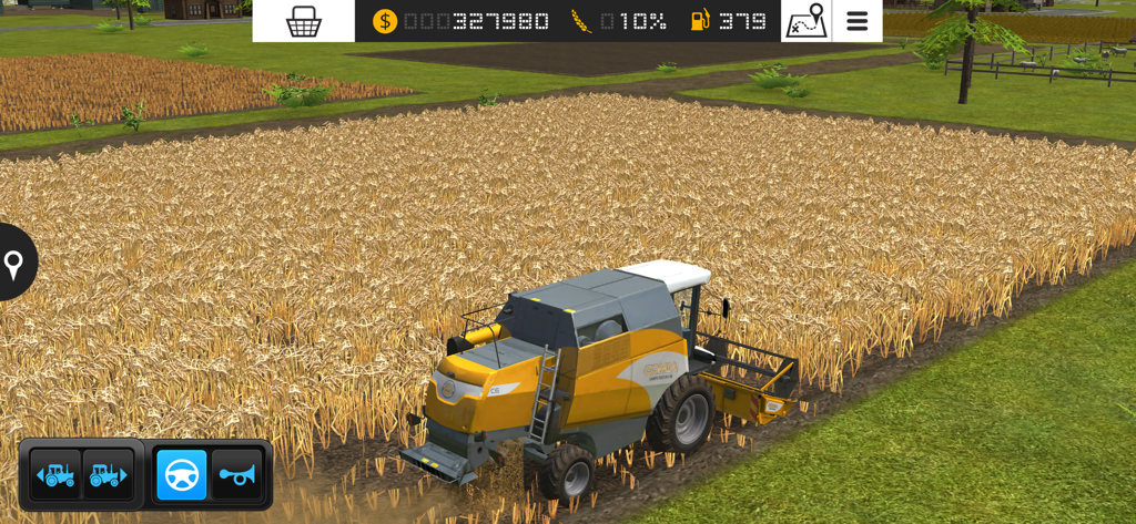 Farming Simulator 16 - Ein gelber Mähdrescher erntet ein Feld mit goldenen Feldfrüchten in Farming Simulator 16