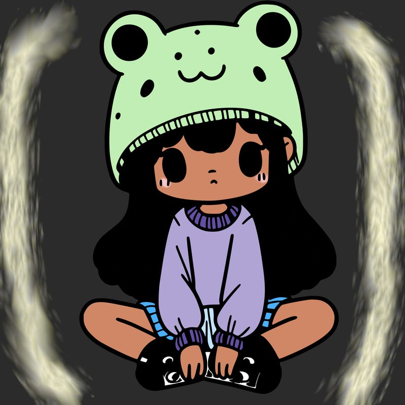 a girl wearing a frog hat and some frog socks