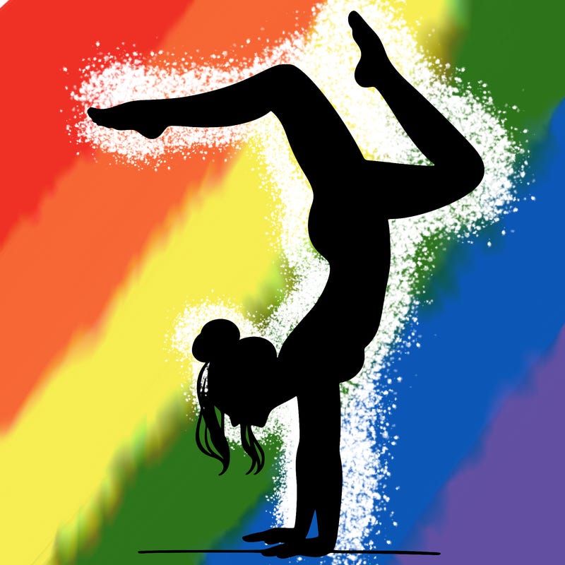 a woman doing a handstand