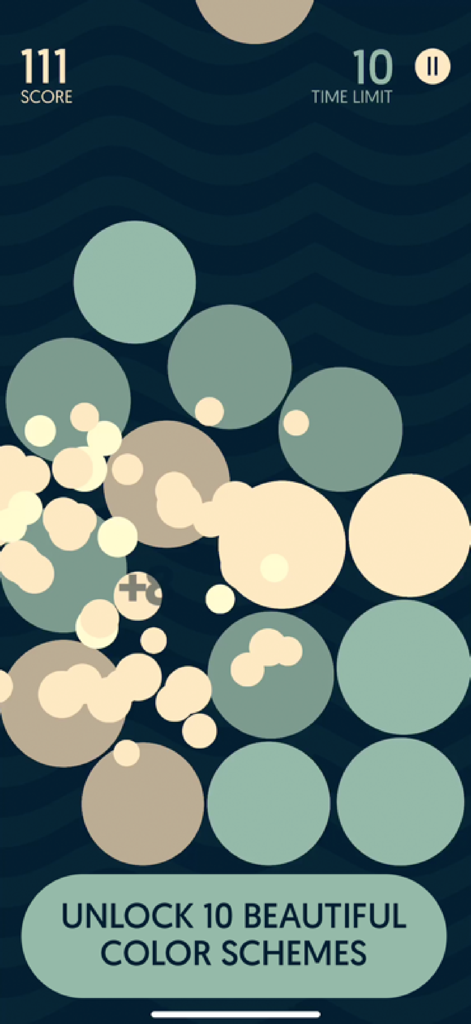 Minimalist gameplay of Dream Bubblez showing colorful bubbles and a notification to unlock ten beautiful color schemes