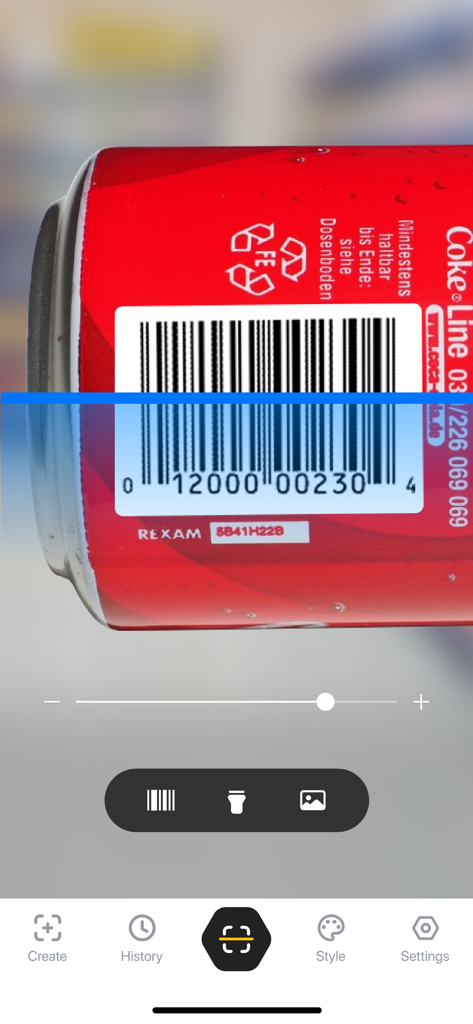 Mobile app scanning a barcode on a red soda can with a blue laser line.