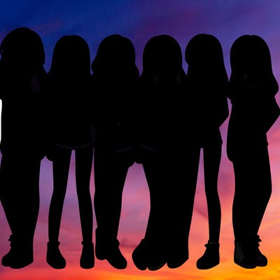 a group of girls wearing crop tops and shorts