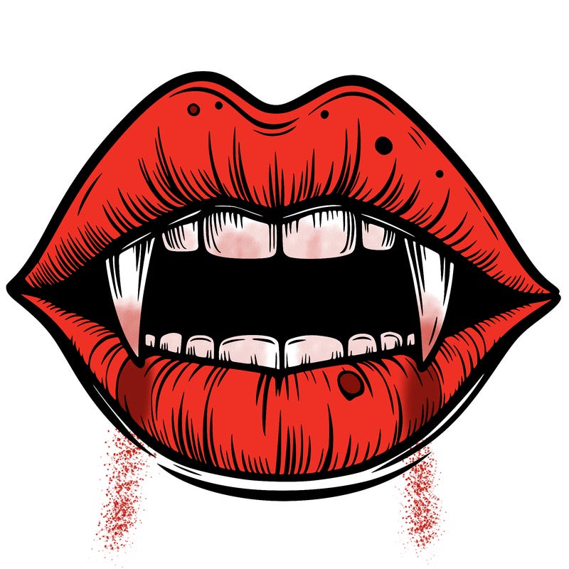 lips with vampire teeth