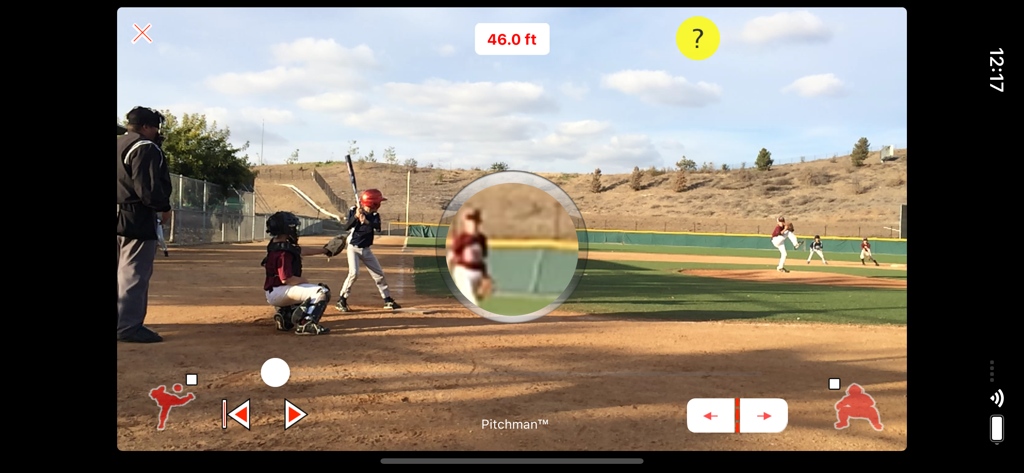 Pitchman Radar Gun - Pitchman Radar Gun app screen showing magnification lens on a baseball pitcher