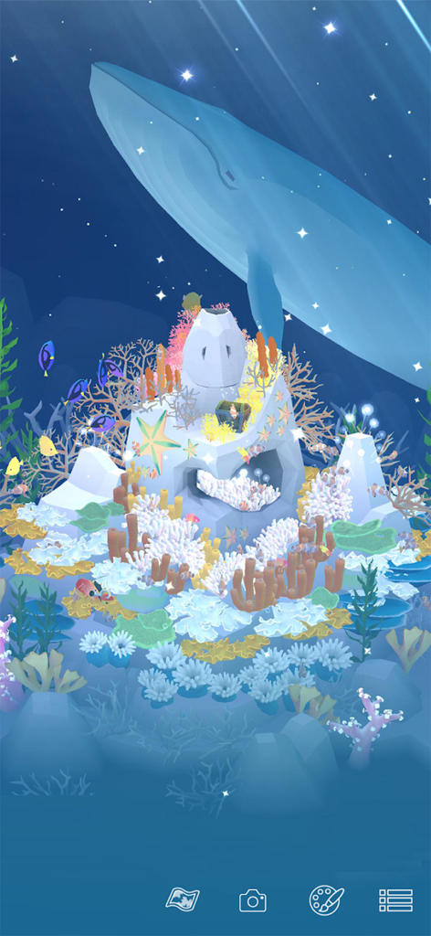 Tap Tap Fish - AbyssRium - A serene underwater scene featuring a large blue whale swimming over a vibrant and colorful coral reef in AbyssRium