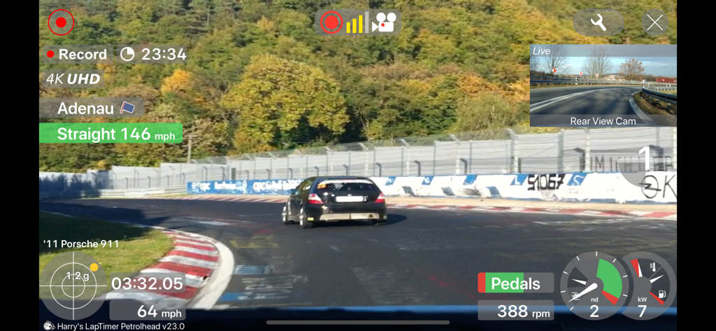 Real time racing telemetry data overlaid on a track video showing speed and lap times