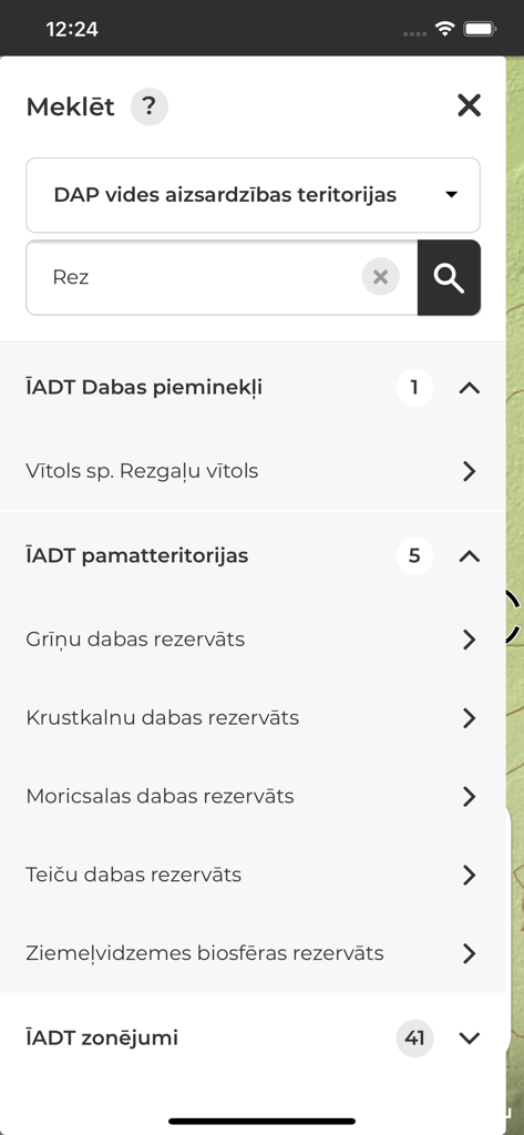 LVM GEO Mobile - Search interface in the LVM GEO Mobile app displaying environmental protection areas and nature reserves in Latvia.