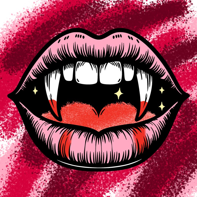 lips with vampire teeth