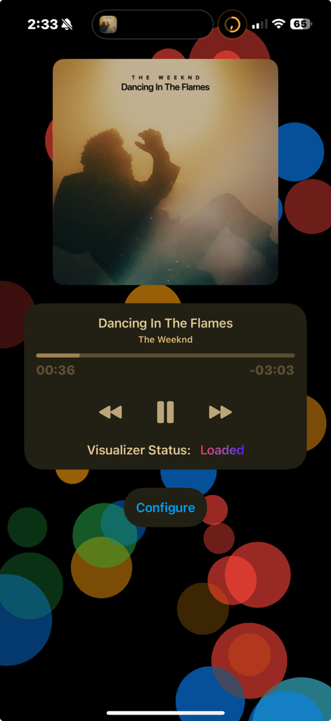 Spatial Music Visualizer - Spatial Music Visualizer app playing music with a colorful particle background and playback controls