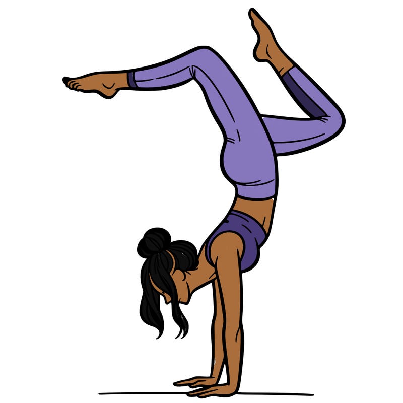 a woman doing a handstand