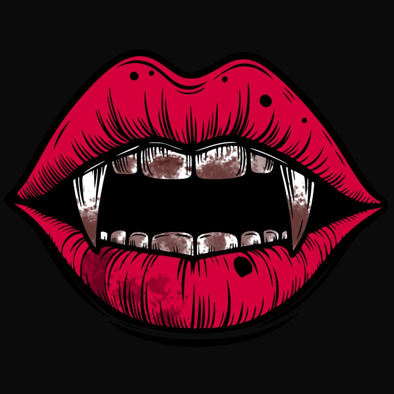 lips with vampire teeth