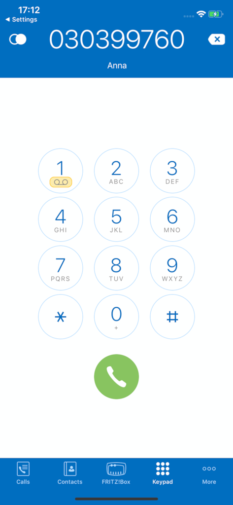 FRITZ App Fon dialer interface with a numeric keypad and a contact name displayed at the top