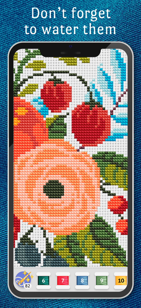 Un motif floral numérique de point de croix affiché sur un écran de téléphone portable
