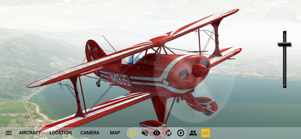 A red and white biplane flying over a coastal city and mountains in GeoFS Flight Simulator