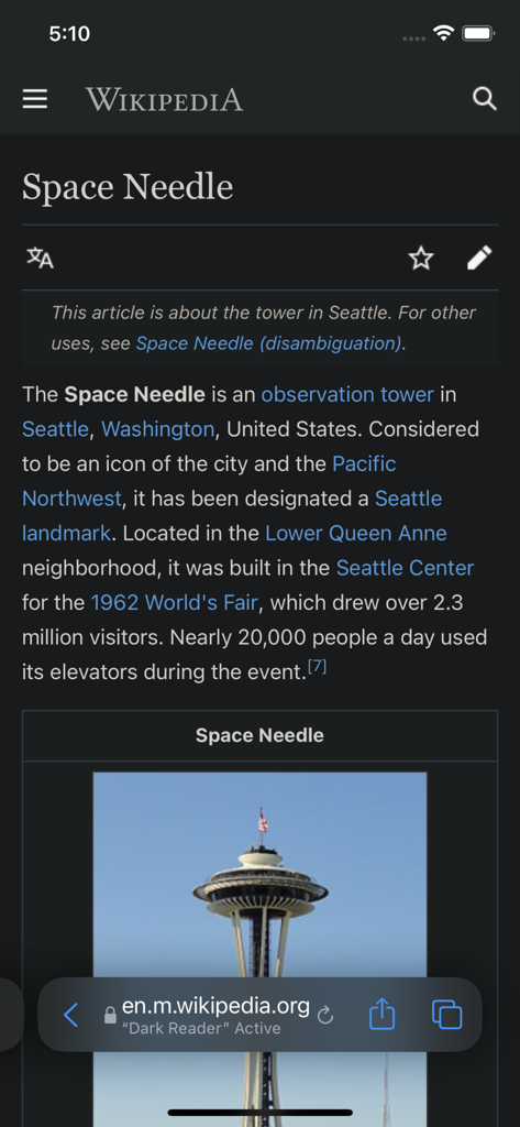 Wikipedia article about the Space Needle displayed in dark mode using the Dark Reader extension for Safari on an iPhone.