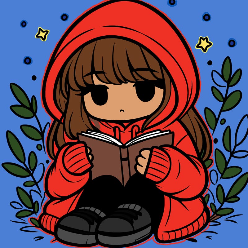 girl in oversized hoodie reading a book