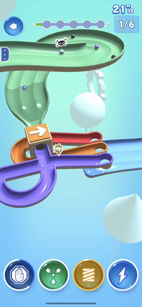 Gameplay screenshot of Marble Dream showing marbles racing on a colorful 3D track with power up icons