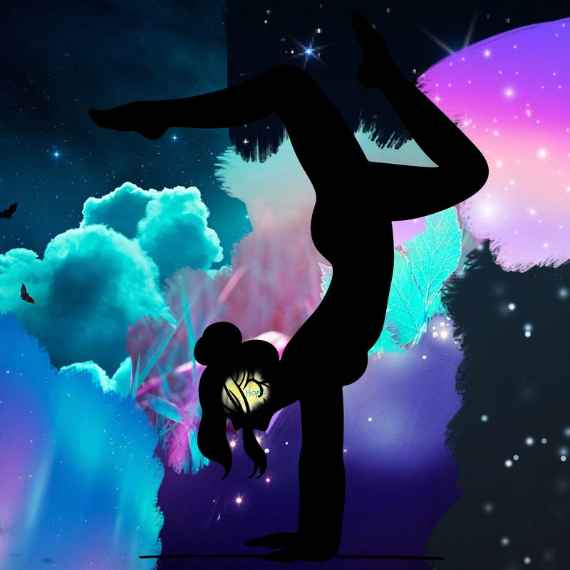 a woman doing a handstand