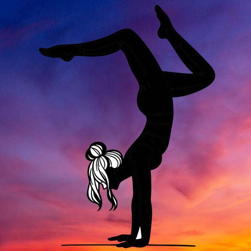 a woman doing a handstand