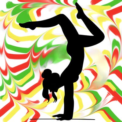 a woman doing a handstand