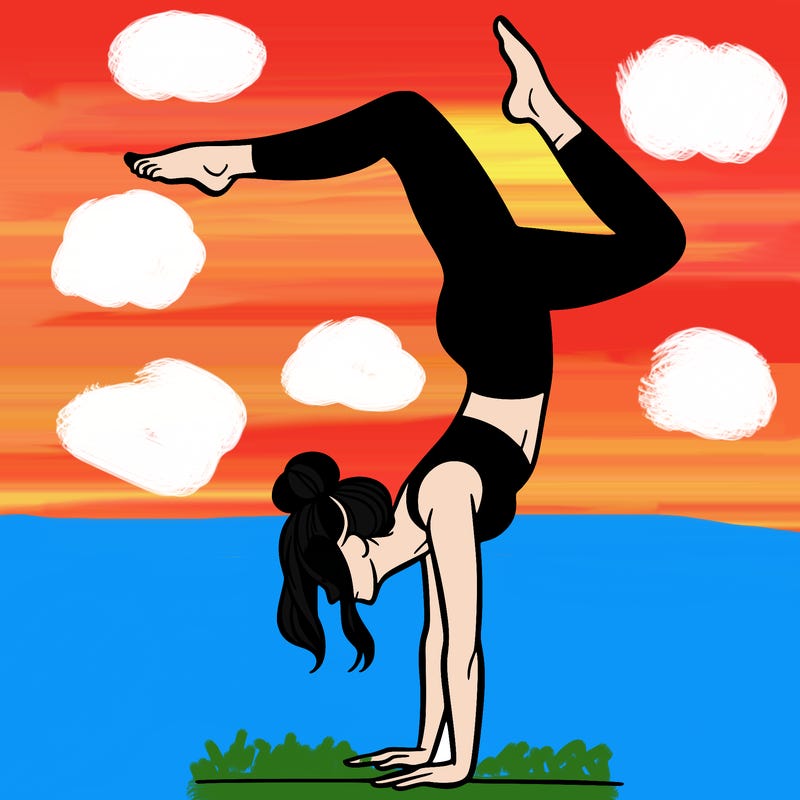 a woman doing a handstand