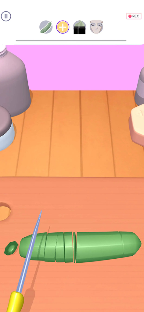 DIY Makeup - A close up of a knife slicing a cucumber on a wooden table to create a DIY face mask in the DIY Makeup app.