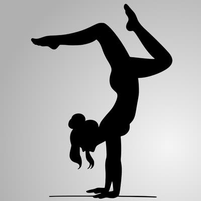a woman doing a handstand