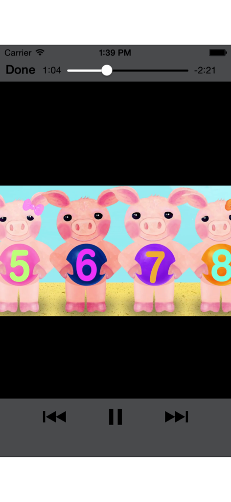 Four pink pigs holding colorful circles with numbers five to eight in a learning app