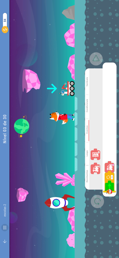 STEM Play - Letramento Digital - Um nível educacional com tema espacial no STEM Play, onde as crianças usam blocos de código para mover um personagem.