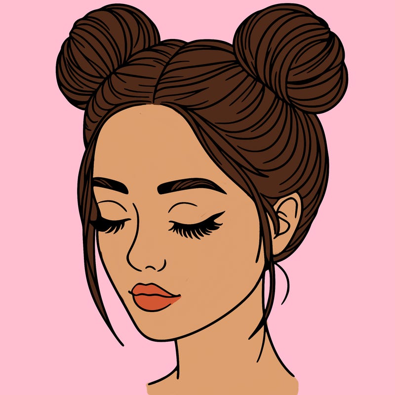 woman with hair buns