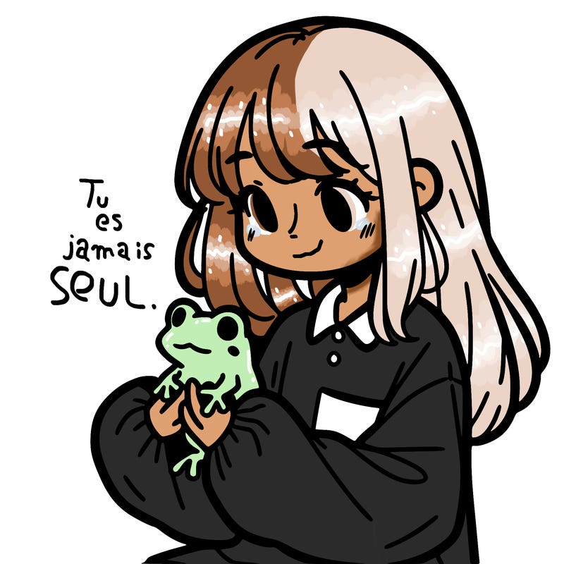 girl with long hair and a oversized shirt. and she is holding a frog