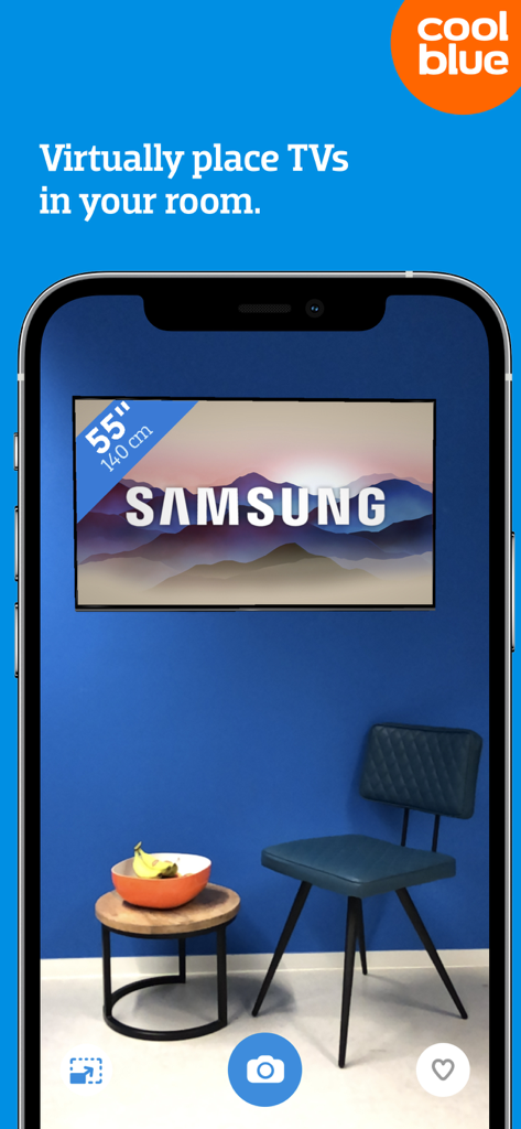 Smartphone screen showing the Coolblue app AR feature virtually placing a 55 inch Samsung TV on a living room wall