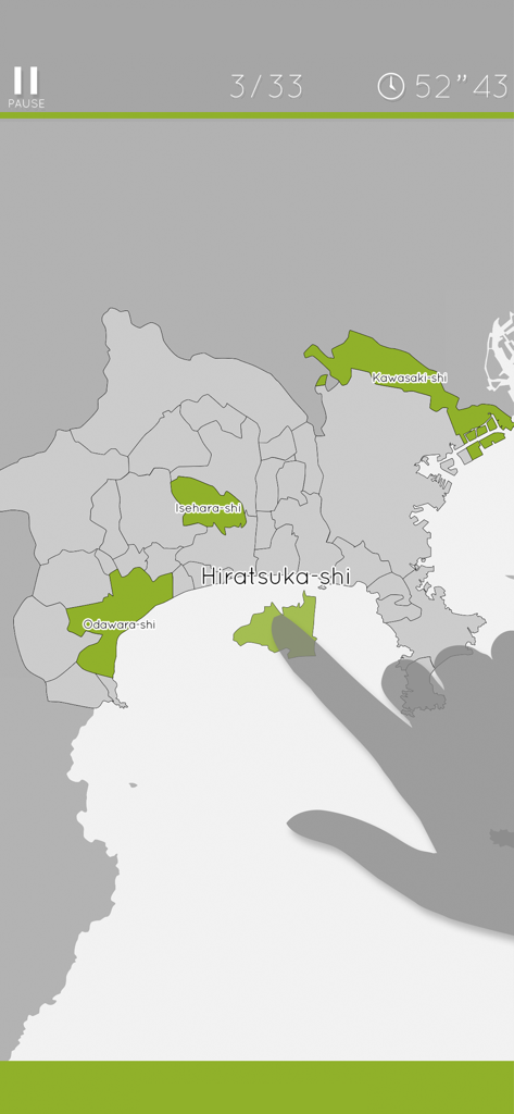 Kanagawa Map Puzzle - Gameplay screenshot showing a hand dragging a region piece into place on the Kanagawa prefecture map