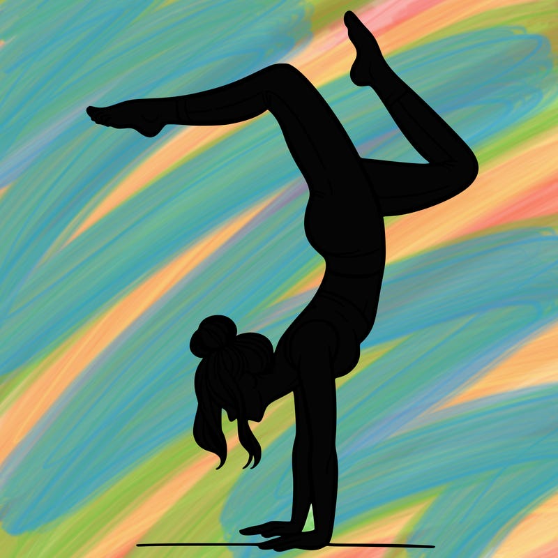 a woman doing a handstand