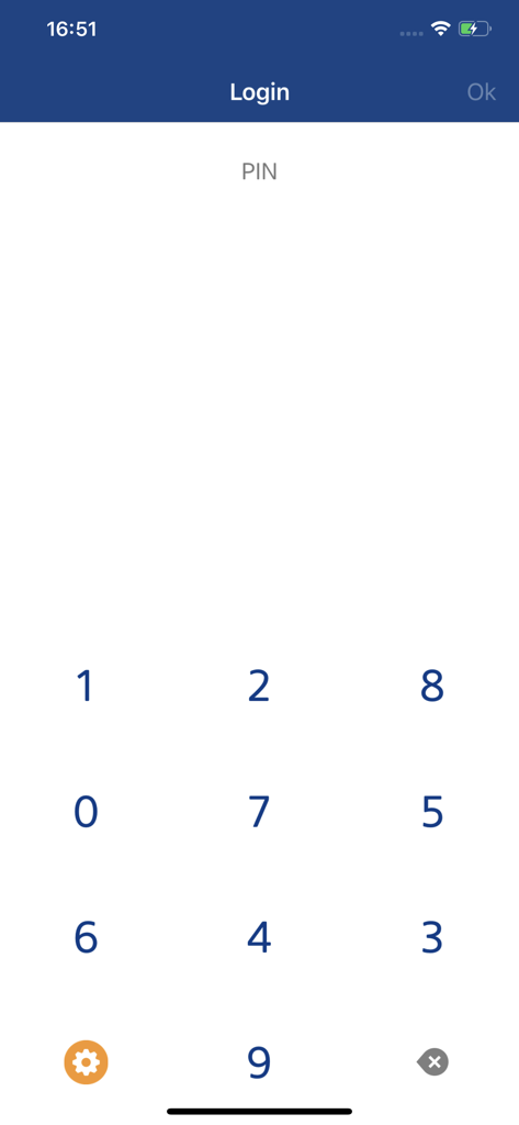 UCB m-Token login screen showing a secure numerical keypad for PIN entry