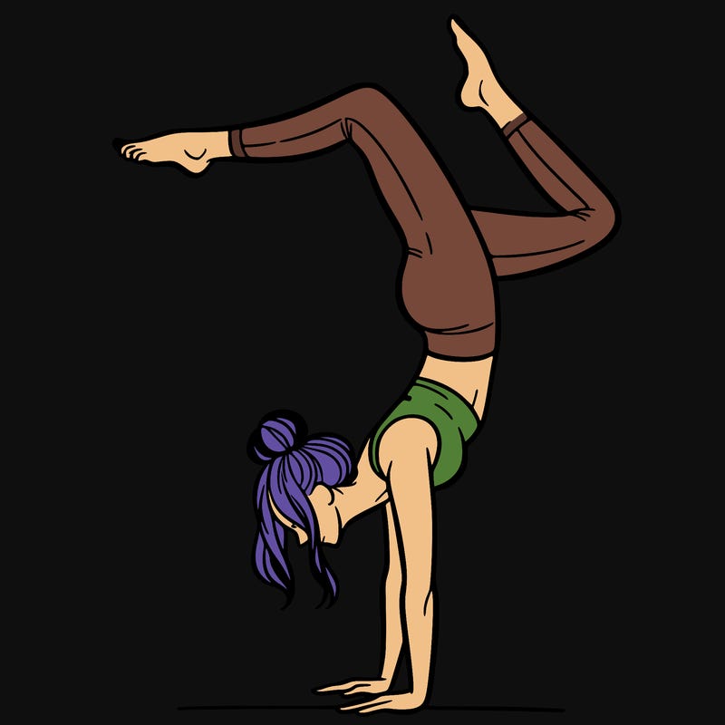 a woman doing a handstand