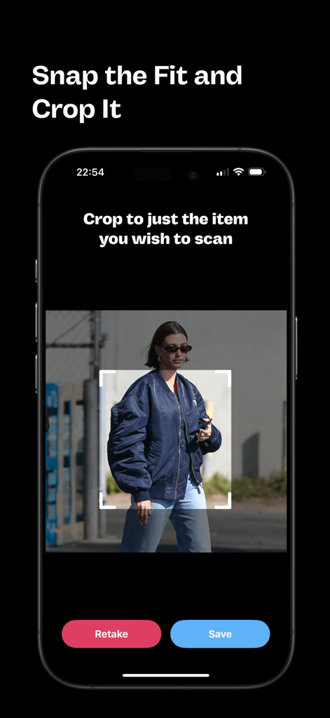 A smartphone screen showing the Fit Finder app interface where a user is cropping a blue bomber jacket from a photo to scan it for similar fashion items.