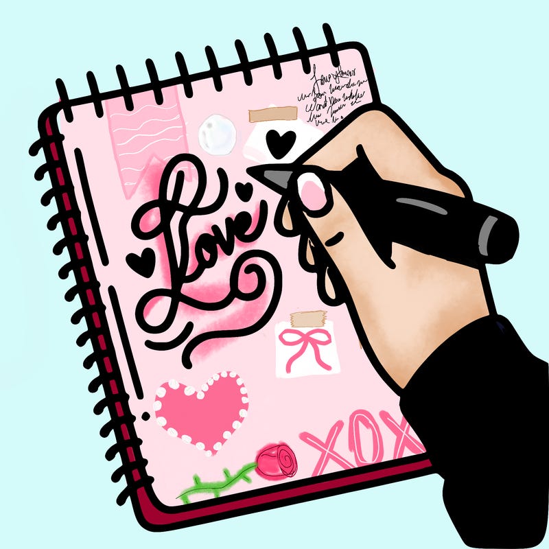 a hand writing “love” in calligraphy on a notebook