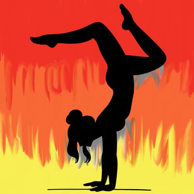 a woman doing a handstand