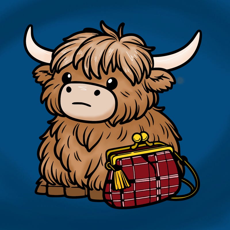 highland cow in a purse