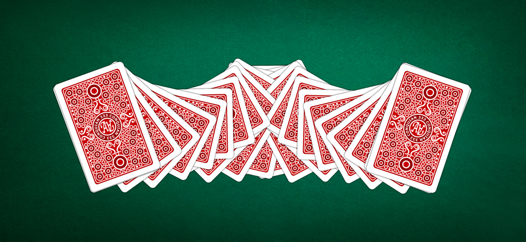 A decorative fan of red and white playing cards with the Conquian 333 logo on a green felt background.