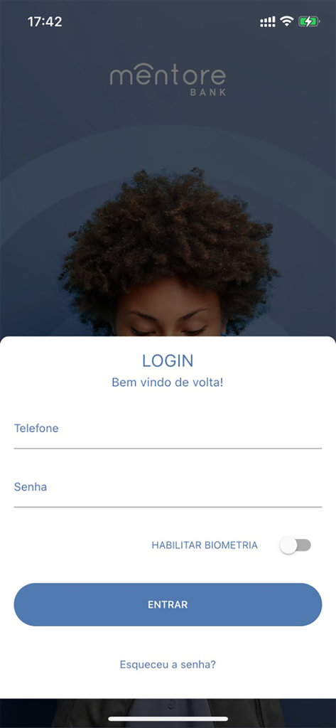Mentore Bank - Schermata di accesso dell'app mobile Mentore Bank con campi per telefono e password e un'opzione biometrica.