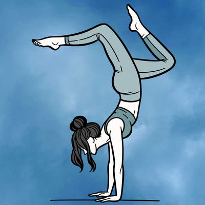 a woman doing a handstand