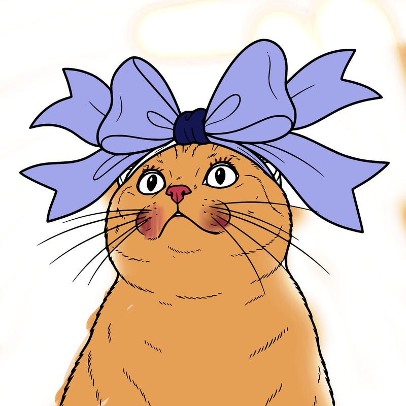 cat with a big bow on her head