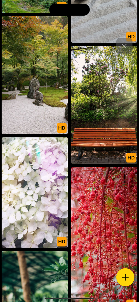 Wallpapers HD: 4K Themes - Una colección de fondos de pantalla de alta definición con temática de naturaleza dentro de una interfaz de aplicación móvil.