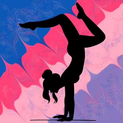 a woman doing a handstand