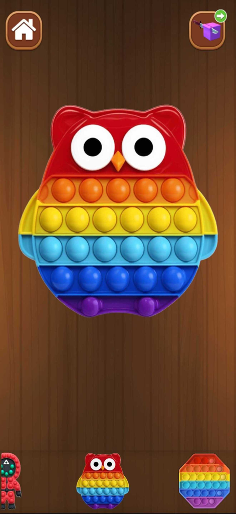 Rainbow owl shaped pop it fidget toy in an antistress app