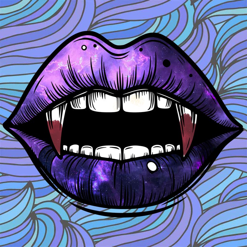 lips with vampire teeth